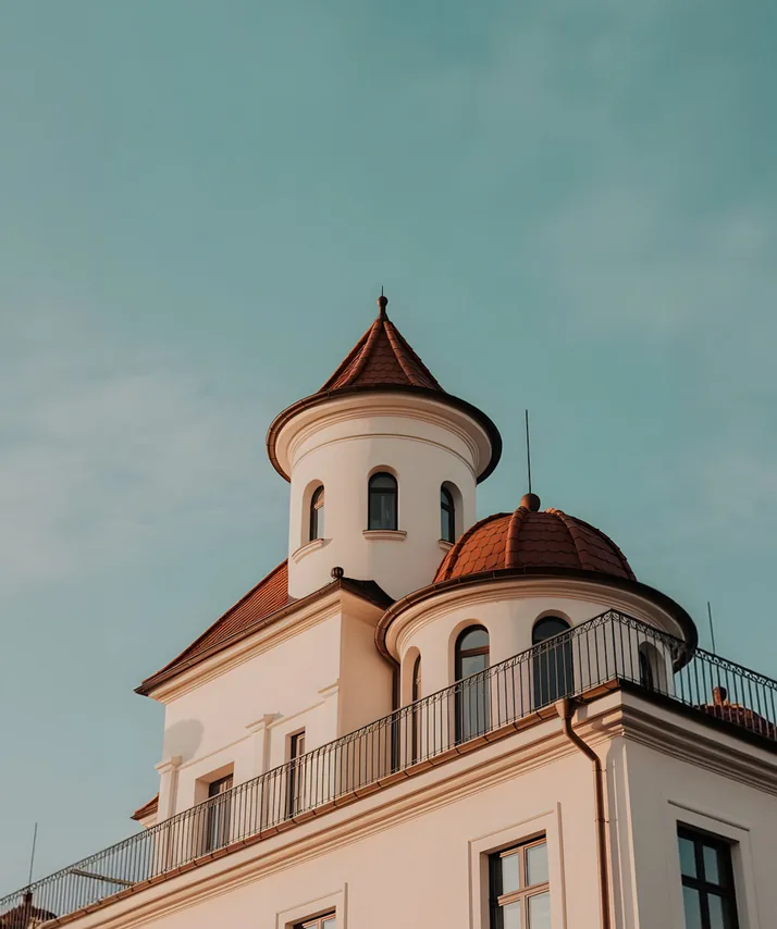 White building with a red roof
